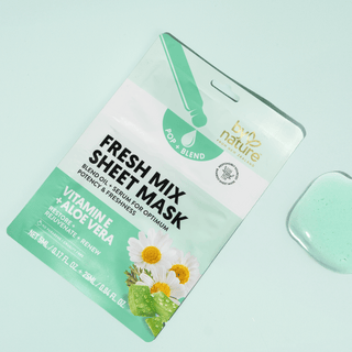By Nature Fresh Mix sheet mask packaging with puddle of jelly and a light green background